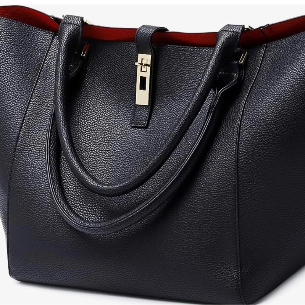 Black, large capacity tote handbag with red interior